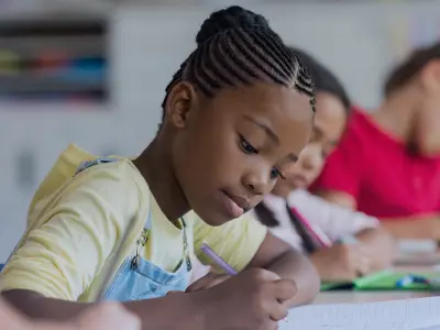 school-students-class students in class writing