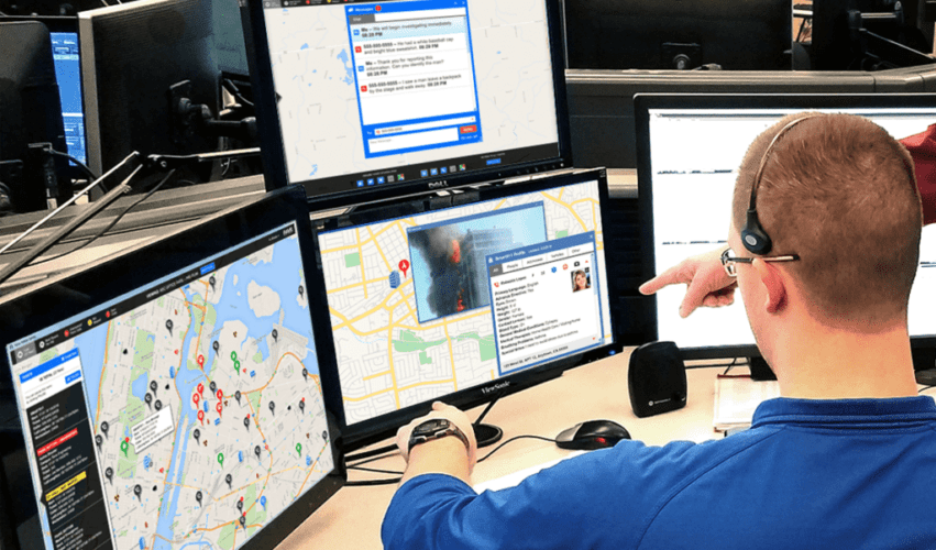 911-suite-in-use-dispatch emergency dispatch coordinator sitting at computer terminal