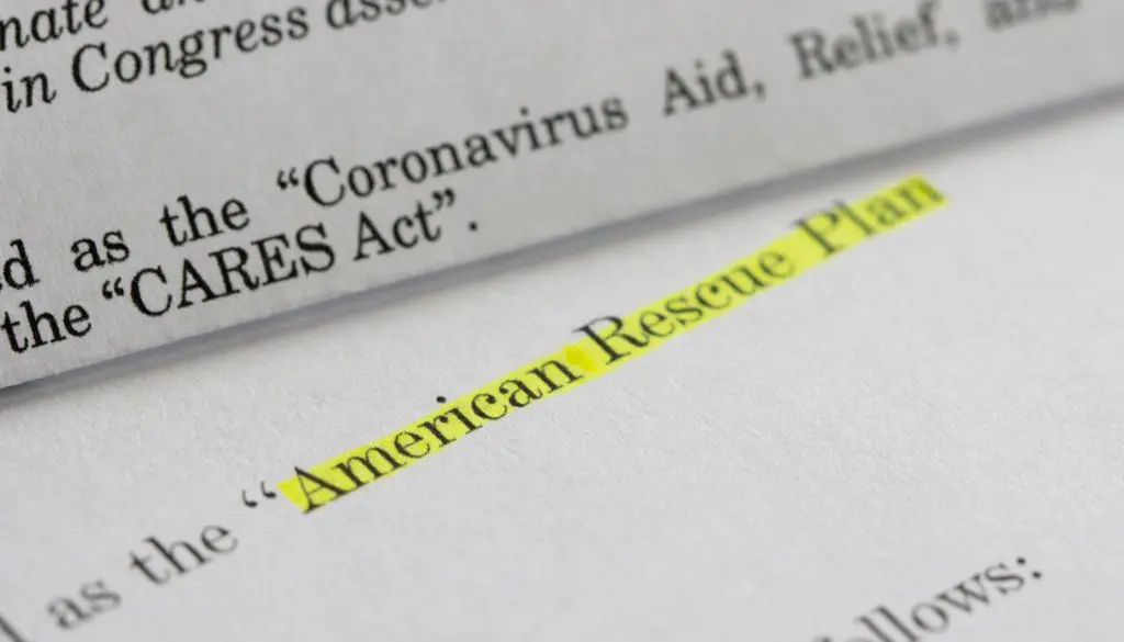 American Rescue Plan text highlighted on a piece of paper