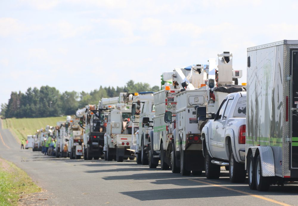 utility trucks parked in a row