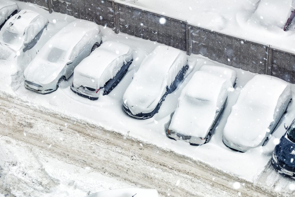 severe weather safety plans snow covered cars in parking lot